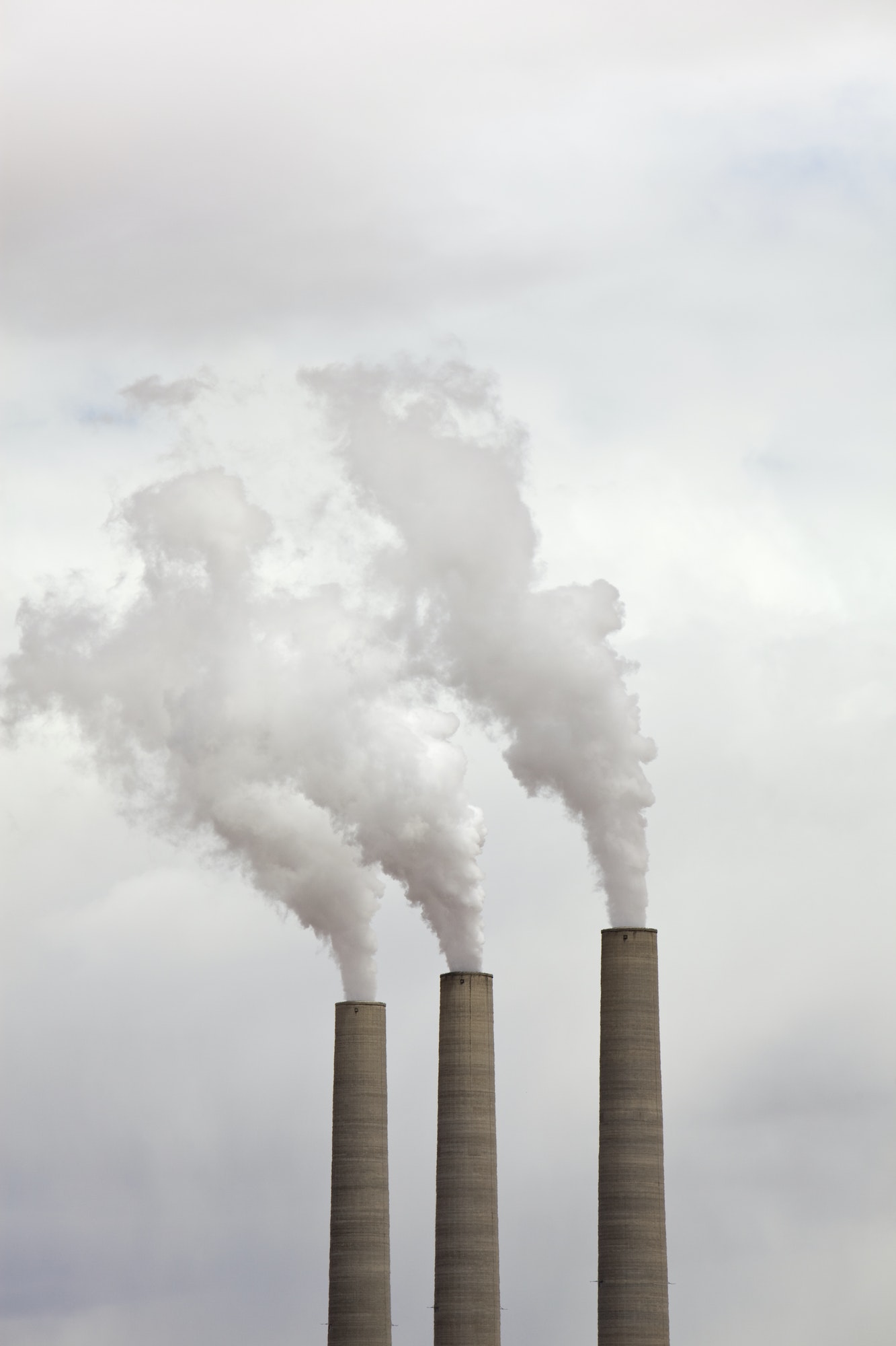 Smoke Coming From Three Smokestacks